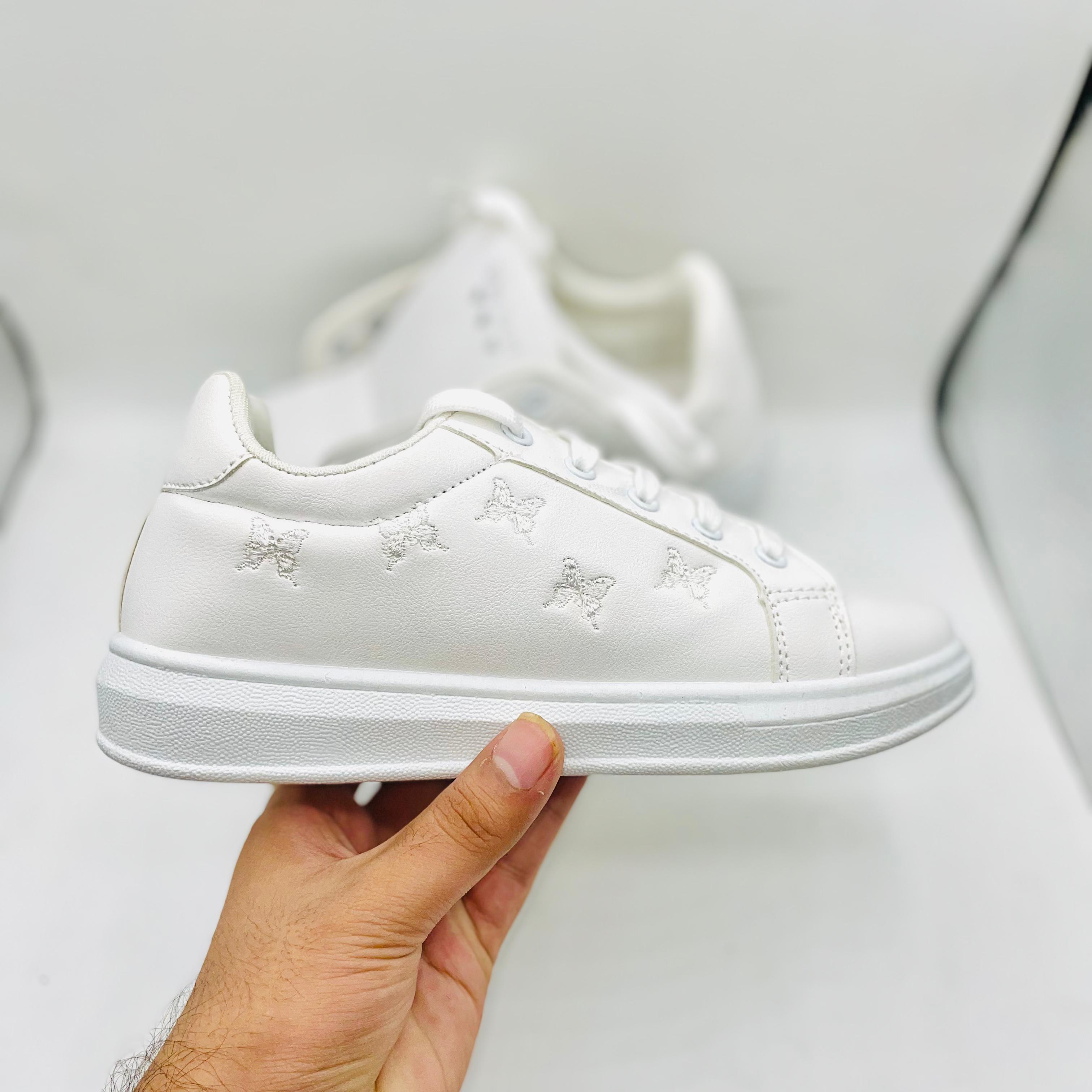 White female sneakers hotsell